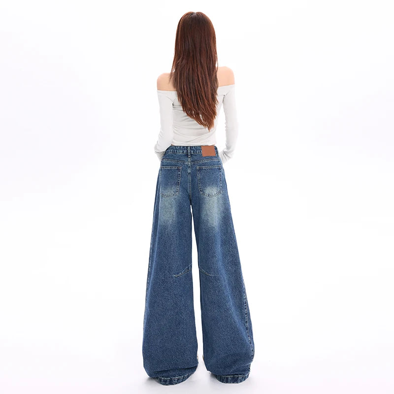 Calça de ganga de mulher estilo vintage americano com modelagem balão e pernas curvas