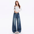 Calça de ganga de mulher estilo vintage americano com modelagem balão e pernas curvas
